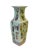 Handmade, square-shaped, porcelain vase featuring a light, pastel green base color. There are multicolor, dimensional...