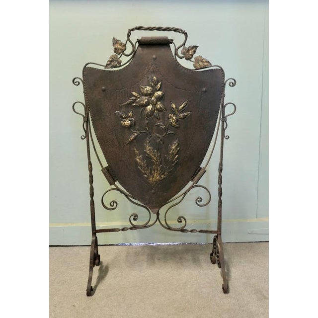 Victorian Arts and Crafts Gothic Shield Iron Fire Screen This is a Classic in the Arts and Crafts Gothic Style, it is a...