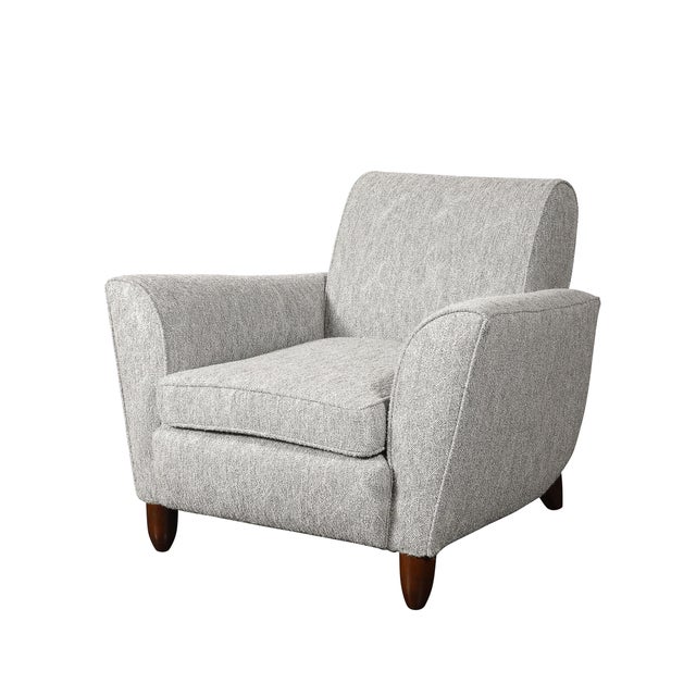 This exceptional pair of Mid-Century Modernist club chairs, designed by the renowned American designer James Mont circa...