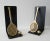 Vintage:m C.1980's Brass tennis racket and ball bookends, made exclusively for Lord & Taylor Dept. Stores, for the...