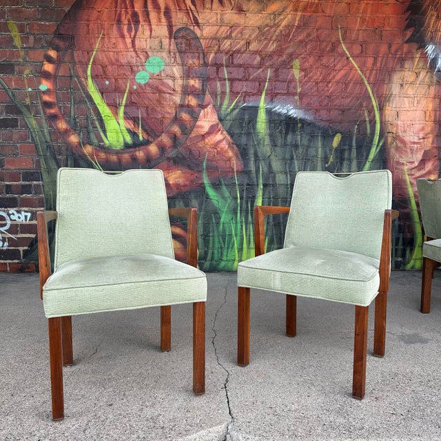 Mid century modern Set of 12 Edward Wormley for Dunbar With Brass Handles and Brass Feet Model 4710A. This set of chairs...