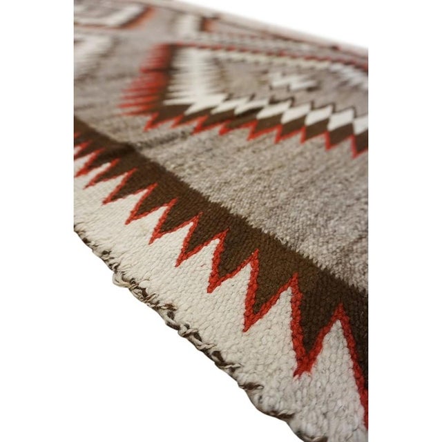 Antique Navajo American Flat Weave Rug allover, Circa Date: 1920s. This exceptional example of early 20th-century weaving...