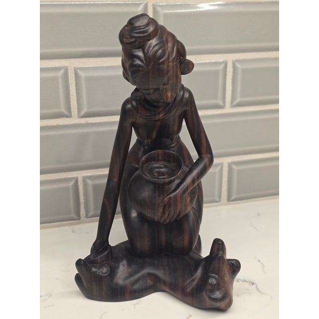 An absolute museum-grade masterpiece of mid-century Balinese modernism, this striking 8-inch sculpture depicts a...