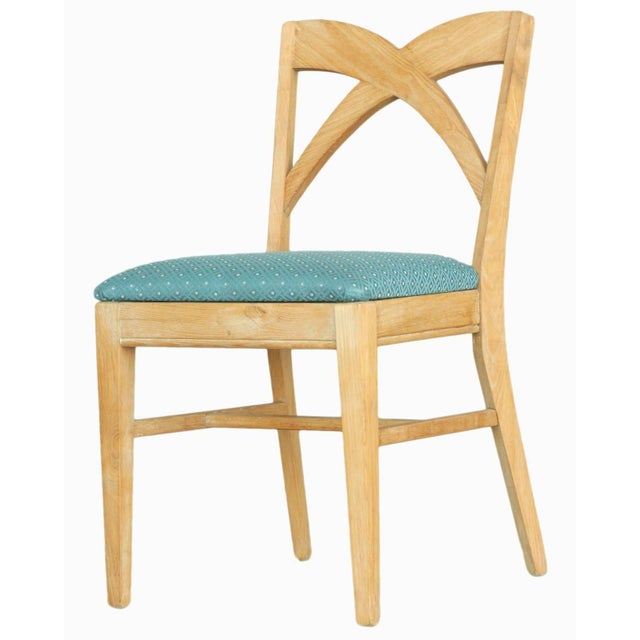 This beautifully restored rattan blends vintage charm with modern comfort. Set of 10 dining chairs by Paul Frankl for the...