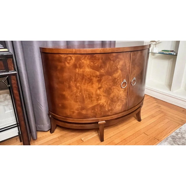 Century Furniture Omni demilune two door cabinet. Walnut double doors, sable color, with fixed shelves. Beautiful star-...