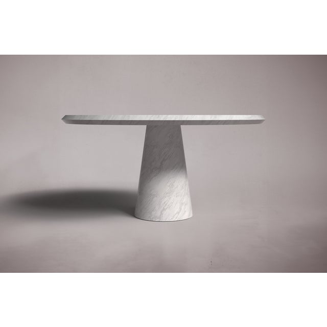 Crafted and hand-finished from solid blocks of Italian Carrara Marble, each piece exhibits the inherent variations in...