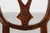 An elegant 18th‑century Gustavian-style chair crafted in walnut and upholstered in leather. This refined piece blends the...