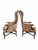 A distinctive pair of vintage wingback Bergère armchairs by Century Chair Company of Hickory, North Carolina, upholstered...
