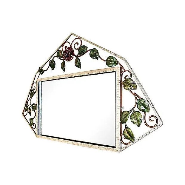 French Art Deco mirror with a silver and bronze finish on hand chased iron frame from the 1920s. Has the original hanging...