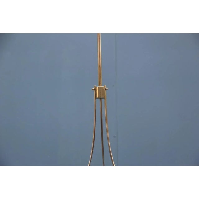 - 1950s Italian ceiling lamp - Green crystal glass plate - Round frosted glass center element - Brass structure - In the...