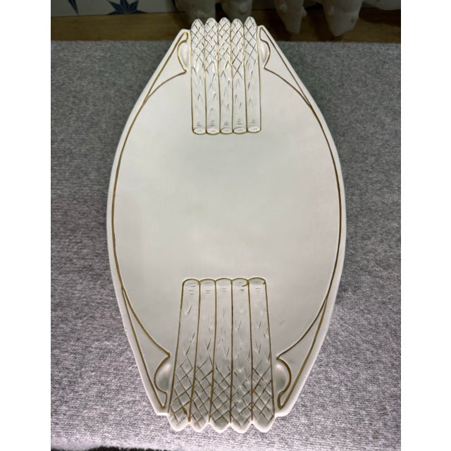 This antique Austria Art Nouveau porcelain asparagus serving dish platter, featuring the impressed beehive mark of...