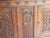 Antique wooden oak credenza with so many details and hand carved ornaments all over. The cupboard has carvings in Gothic...