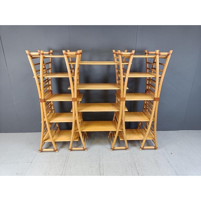 Vintage bamboo book case with a beautiful design. Curved bamboo stands with plenty of shelves providing a lot of...