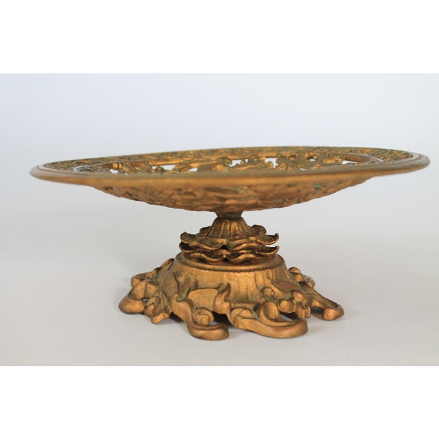 Antique cast iron Neoclassical style compote pedestal bowl. Marked "Iron Art" on bottom. The bowl portion is slightly...