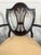 This is a stunning full set of six antique Hepplewhite or Duncan Phyfe style mahogany dining chairs including one arm...