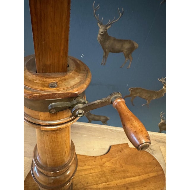 Antique adjustable reading table. The table is height-adjustable and the top can rotate in both directions. These types of...