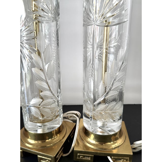 Vintage mid-20th-century Dresden-style cut crystal and brass cylinder table lamps featuring intricate floral and leaf...
