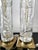 Vintage mid-20th-century Dresden-style cut crystal and brass cylinder table lamps featuring intricate floral and leaf...