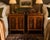 An elegant pair of early 20th century Federal Revival bedside cabinets showcasing finely detailed marquetry, satinwood-...