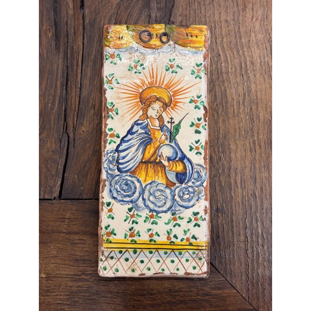 19th century San Donato hand-painted Madonna tile. 4 1/4"W x 9 3/4"H x 3/4"D San Donato Italian Ceramic tiles are...