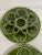 A beautiful French Majolica Longchamp glazed oyster plate in a vibrant emerald green color from circa early 1920s. The...