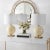 Illuminate your space with the elegant Anina, a set of two 24 inch cream glass table lamps. These lamps offer a perfect...
