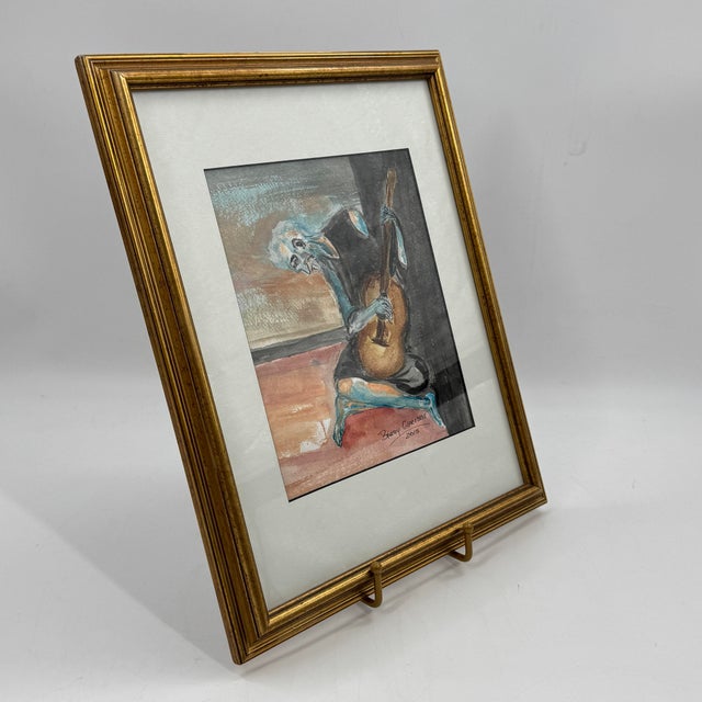 Signed original watercolor on paper depicting a seated guitarist in a composition inspired by Picasso’s celebrated The Old...