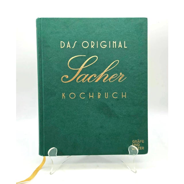 Offered is a German-language printed edition of "Das Original Sacher Kochbuch", a traditional cookbook published by the...