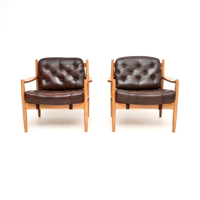 A smart, stylish and very comfortable pair of Swedish vintage leather and birch armchairs by Ingemar Thillmark for OPE....