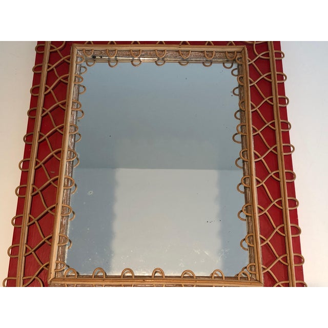 Mid-Century Modern Rattan mirror on a red background. French work. Circa 1940 For Sale - Image 3 of 12