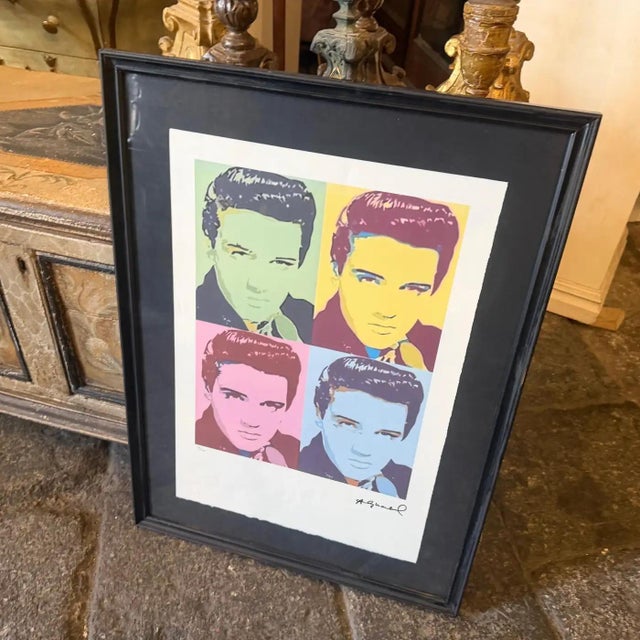 This striking 21st-century lithograph celebrates the intersection of two icons through the unmistakable lens of Andy...
