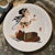 This vintage collector plate is a beautiful piece depicting a spiritual Hindu goddess holding a lotus flower. The round...