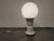 Vintage italian space age opaline globe table lamp with a ceramic base. This minimalist table lamp emits a beautiful soft...