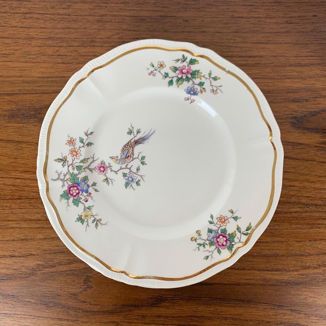 Set of 10 dessert plates, "Chantilly" model by Longchamp, 1950/60 Crane and flower decor in Japanese style with gold...