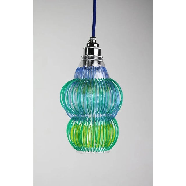 Lluvia 002 pendant lamp by anabella georgi dimensions: diameter 26 x height 12 cm materials: recyclable pet plastic...