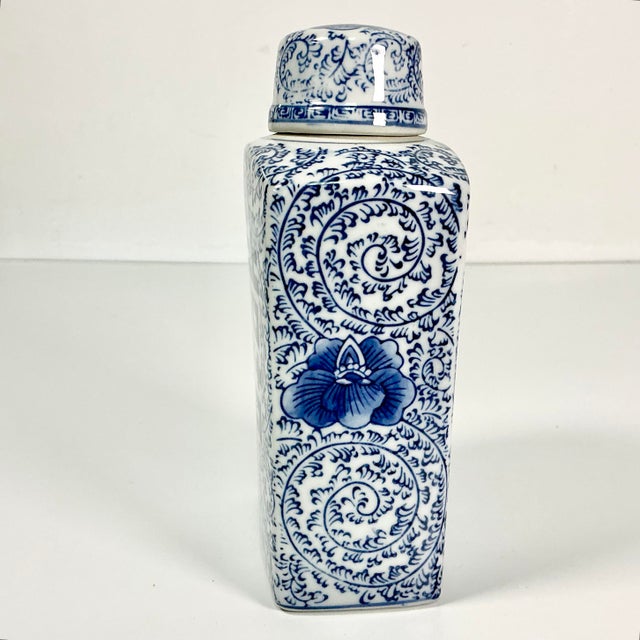 This Chinoiserie Square Ginger Jar feature a hand-painted Happiness symbol on two sides. It also has an overall swirled...