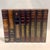 Burgundy Vintage Theodore Alexander Style Trompe L’oeil Wood Book Spine Library Facade For Sale - Image 8 of 12