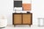 Mid Century Modern Cabinet featuring distinctive caned front doors that add texture and character. Its compact size makes...