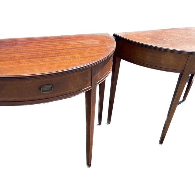 This is a pair of matching Demi Lune tables from Williams Smith, Grand Rapids, MI. Each table has one drawer. In very good...