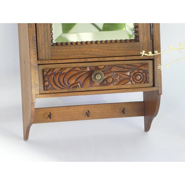 Small Wooden Apothecary Wall Cabinet with Mirror, Carved Floral Details and Drawer, 1940s For Sale - Image 4 of 11