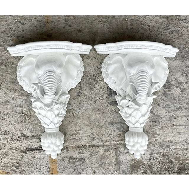 A fabulous pair of vintage Boho brackets. A chic pair of handsome elephants in a bright white finish. Perfect indoors or...