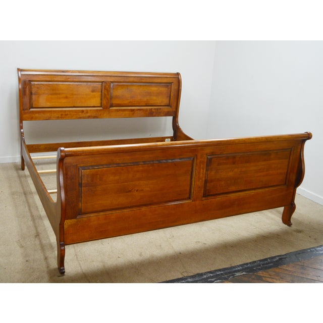 King Bed by Ethan Allen. Store item #551. It features solid wood construction and come with slats.