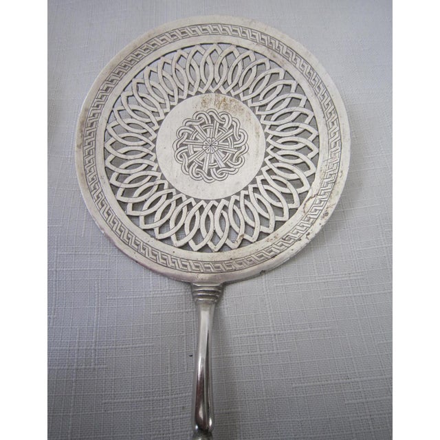 Ornate Silverplate Sugar Sifters from the early 1900's. An elegant addition to any table. They are silver plate on copper...