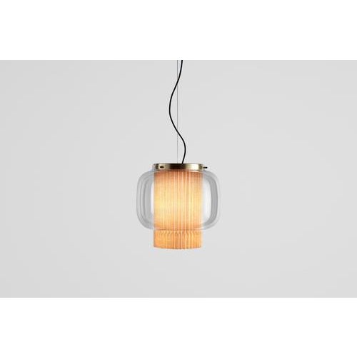 Manila t gr by sebastian herkner an incredibly elegant combination of artisanal blown glass and a plissé textile diffuser....