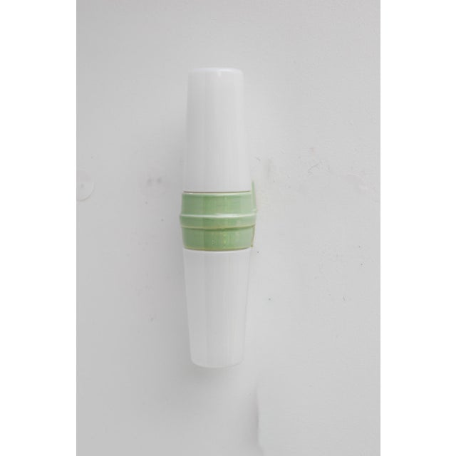 A rare mid-century modern double wall sconce designed by sigvard bernadotte for ifö, sweden, circa 1950s. this elegant...