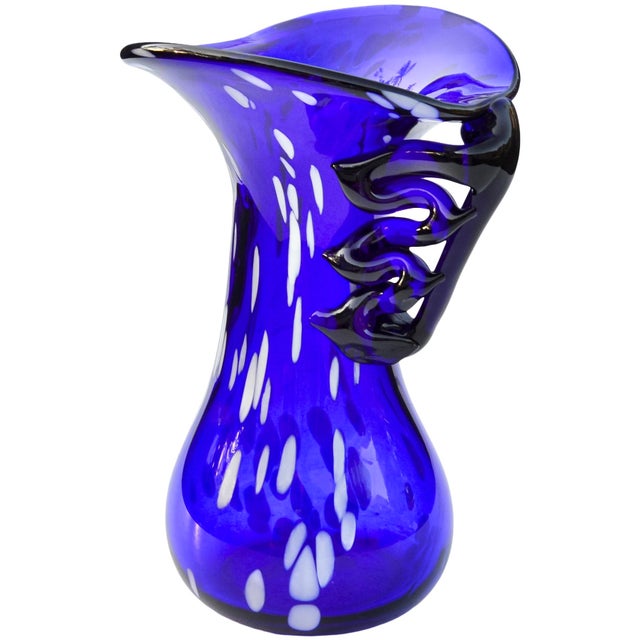 Striking and playful midcentury handblown heavy glass vase, exquisitely hand-crafted in a remarkable sleek sculptural form...