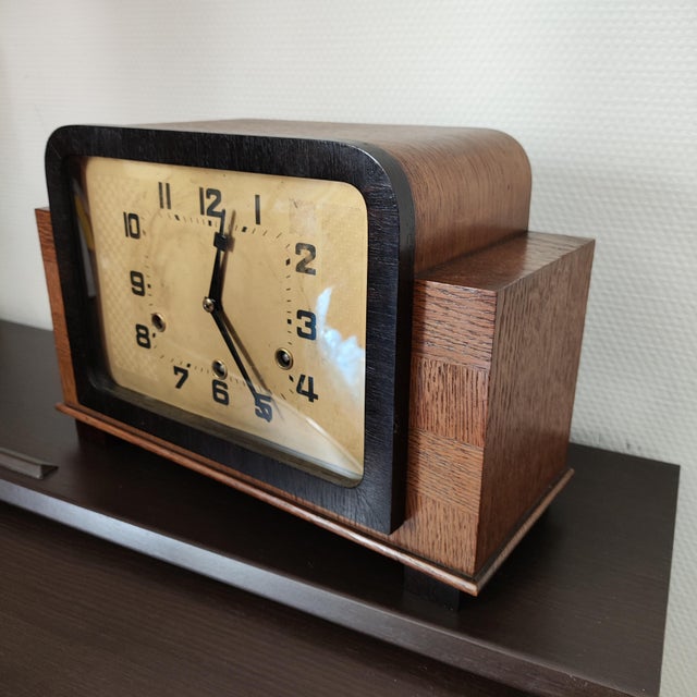Magnificent antique German mechanical mantel clock manufactured by Hamburg Amerikanische Uhrenfabrik (HAU) featuring the...