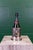 A lovely example of a late 19th century silver plated wine bottle holder from England. Originally designed to hold wine...