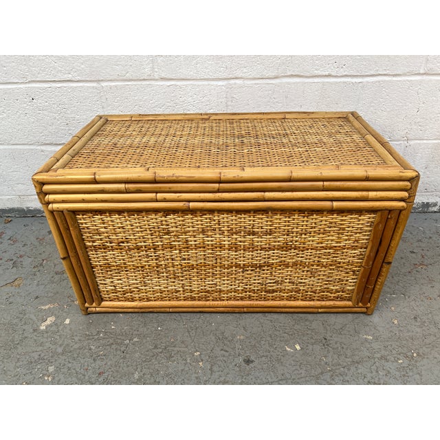 Bring natural warmth and relaxed sophistication to your space with this beautifully crafted vintage woven rattan and...