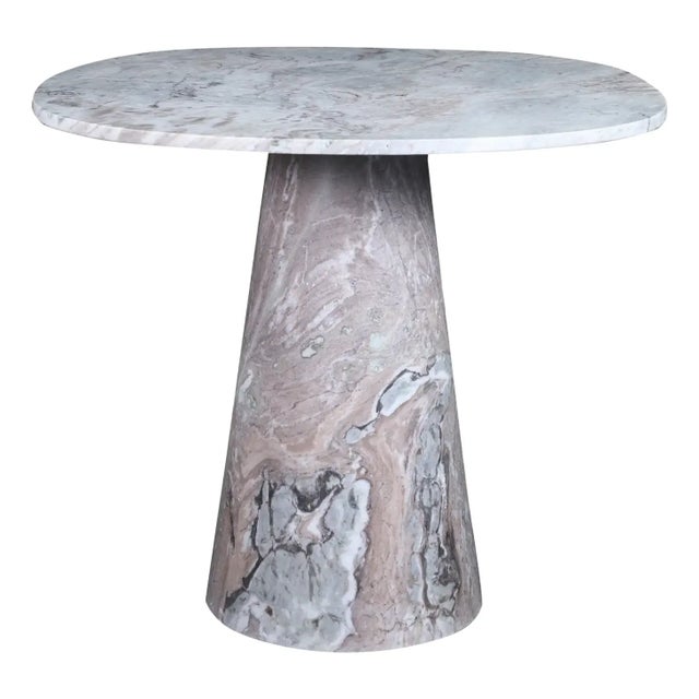 Fabulous marble accent table. Attractive cylindrical base and top with soft squared corners. The marble comes in neutral...